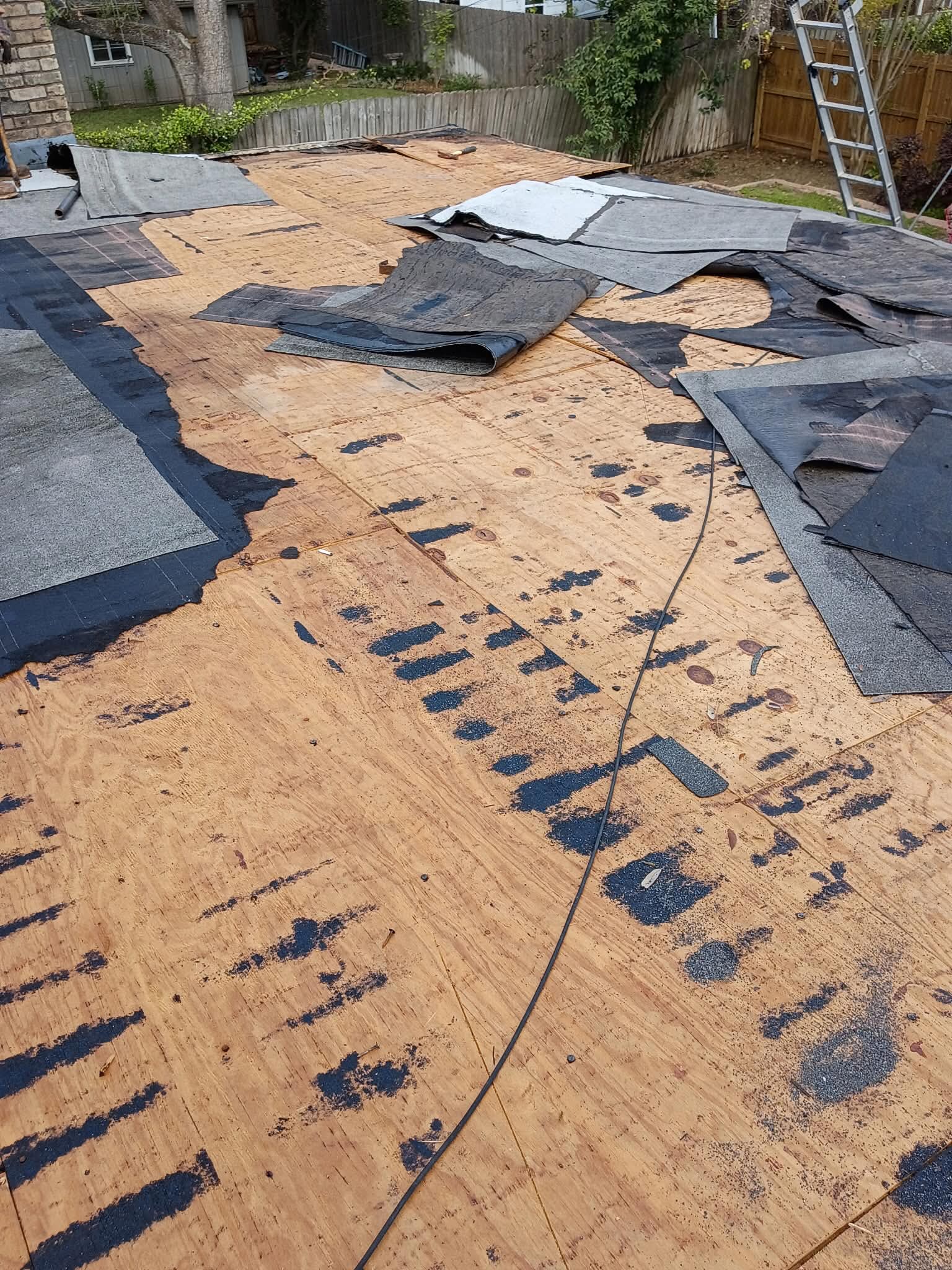 Roof deck open during tear-off and prep